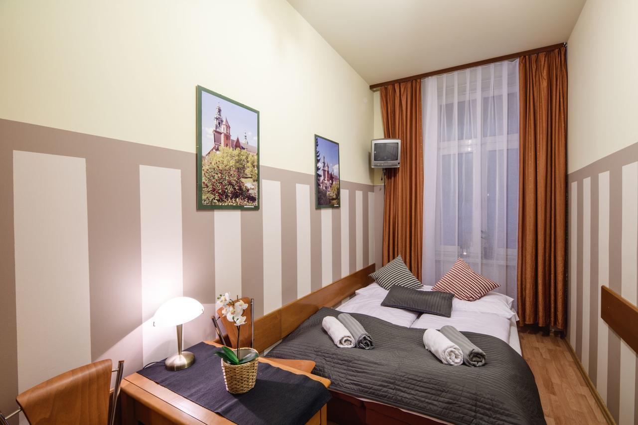 Golden Lion Guest Rooms Szewska 19 Cracovia Esterno foto