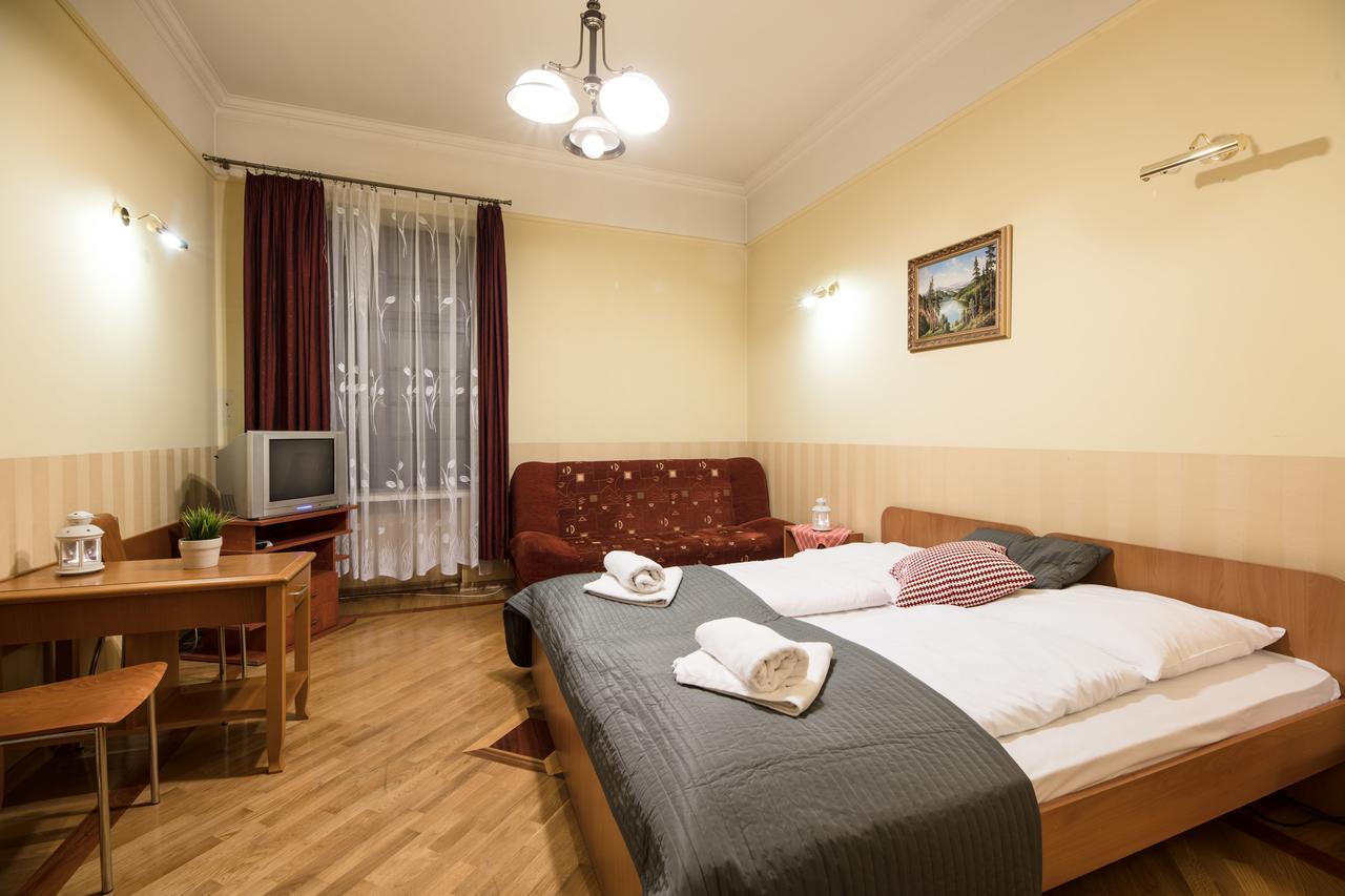 Golden Lion Guest Rooms Szewska 19 Cracovia Esterno foto