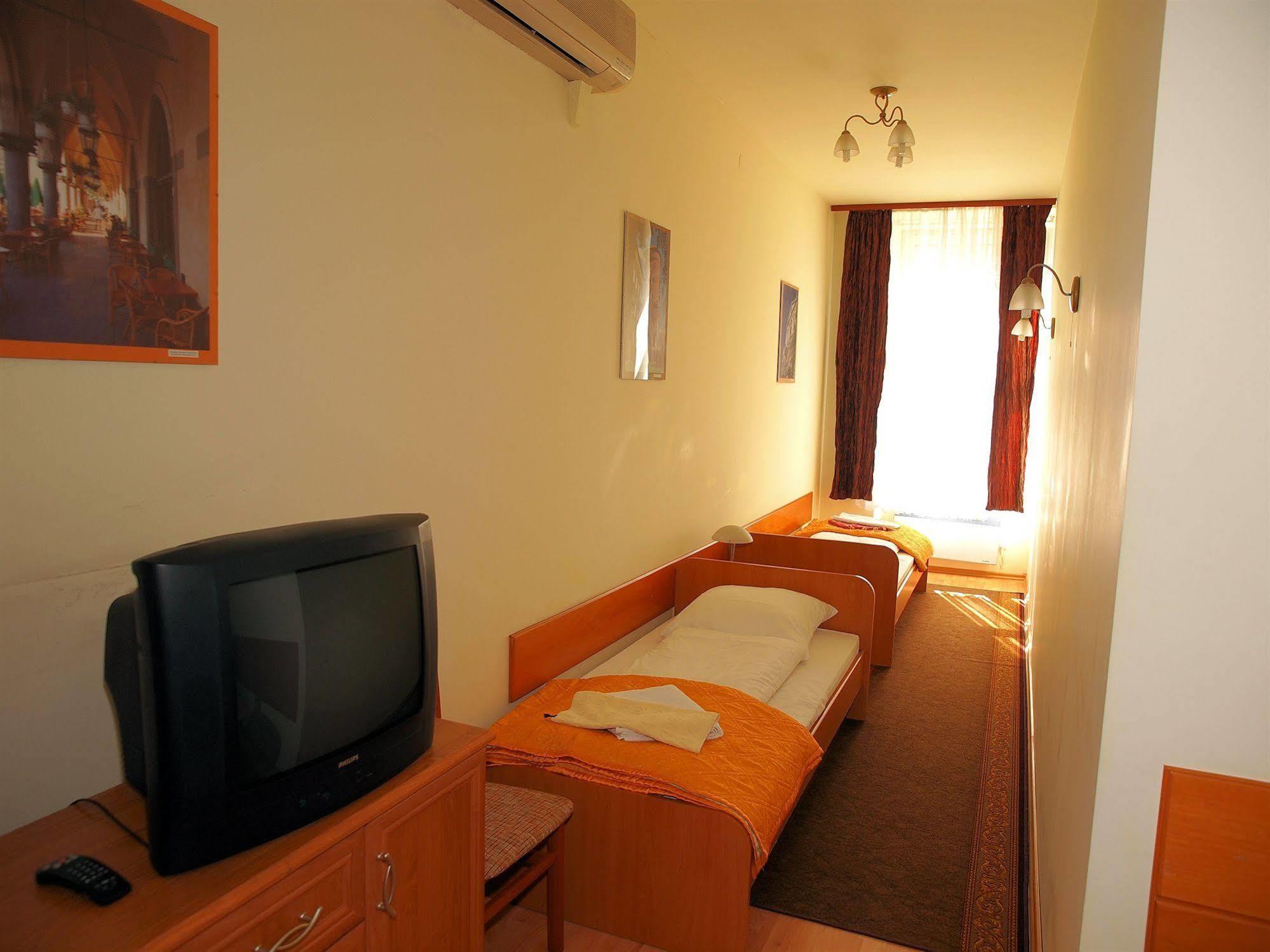 Golden Lion Guest Rooms Szewska 19 Cracovia Esterno foto